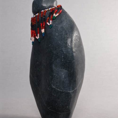 Beaded Woman by Mary Tutsuitok