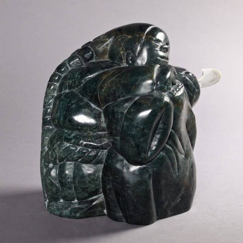 Femme et ulu par Adamie Inukpuk