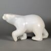 Walking polar bear sculpture by inuit artist Ashevask Adla