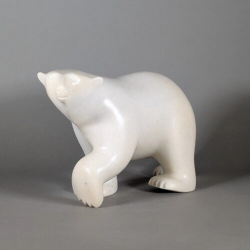 Walking polar bear sculpture by inuit artist Ashevask Adla