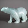 Walking polar bear sculpture by inuit artist Ashevask Adla